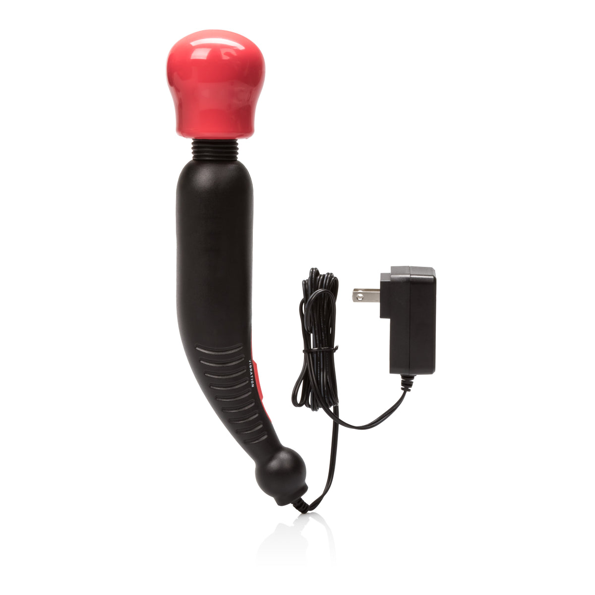 White plug-in massager wand with black trim resting on clean surface.