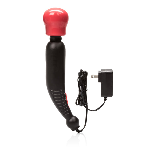 White plug-in massager wand with black trim resting on clean surface.