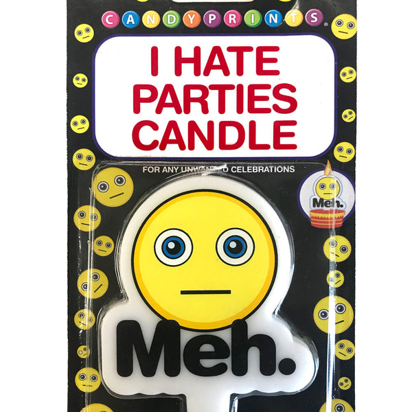 Yellow “I Hate Parties” cake-style Meh Candle by Little Genie with cheerful Emoji-style face.